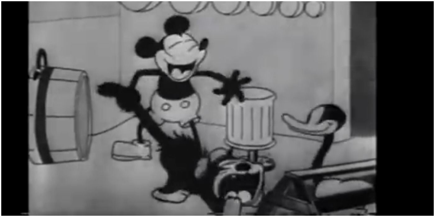 Disney Steamboat Willie Mickey pulls cat's tail