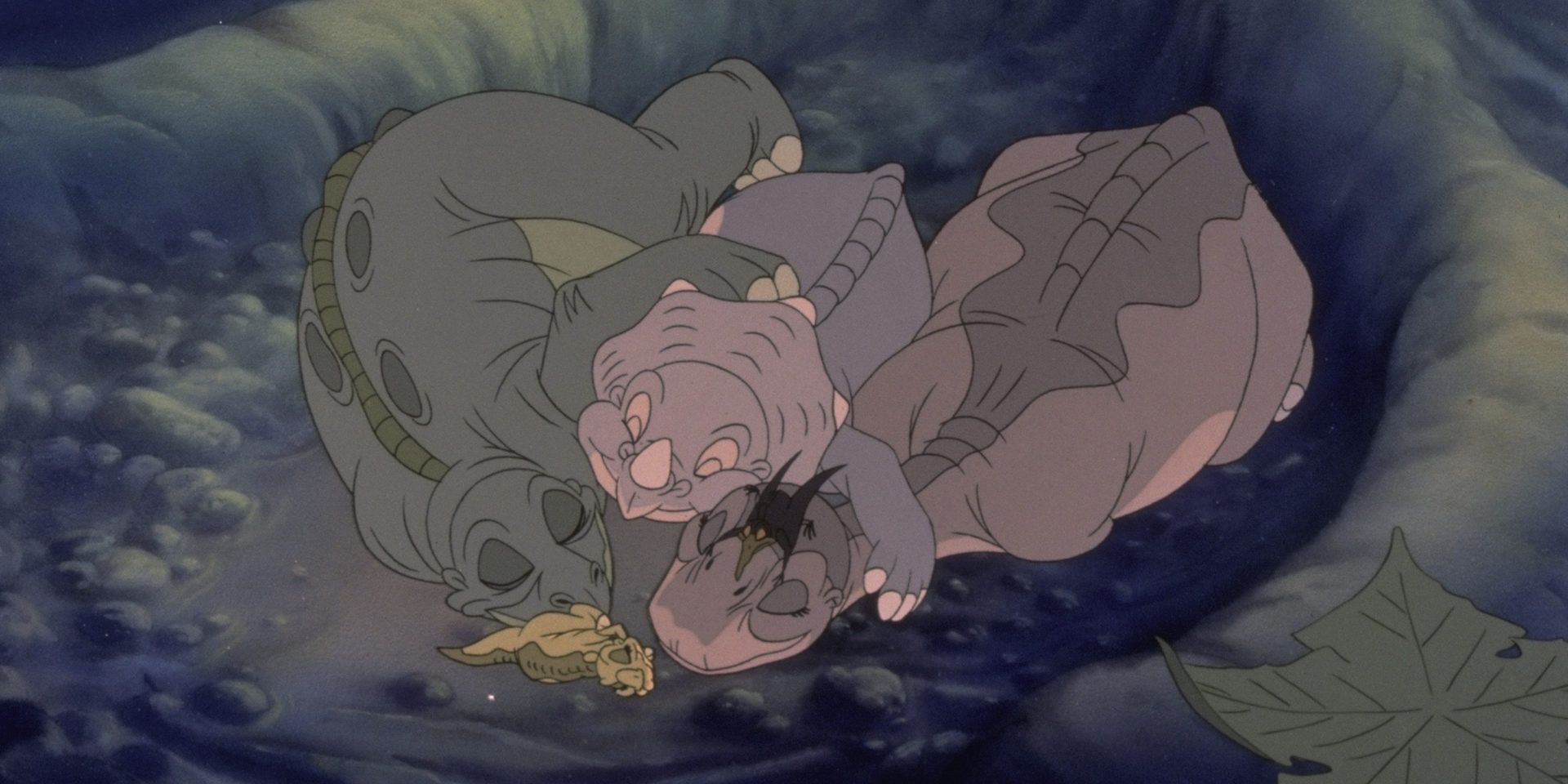 The dinosaurs sleeping together in The Land Before Time Cropped