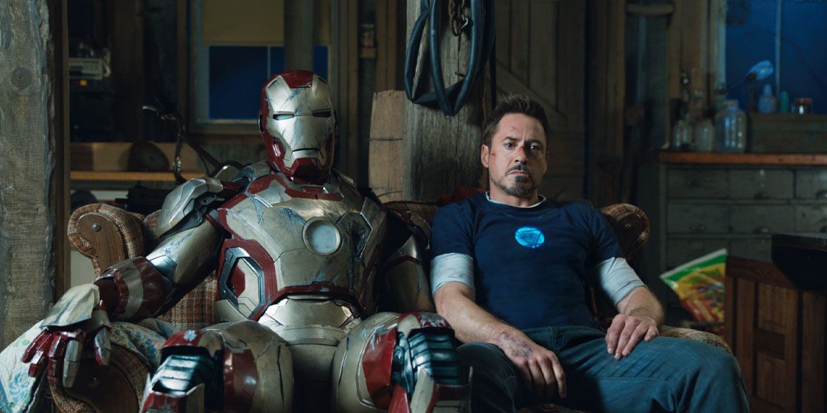 tony sits with his suit