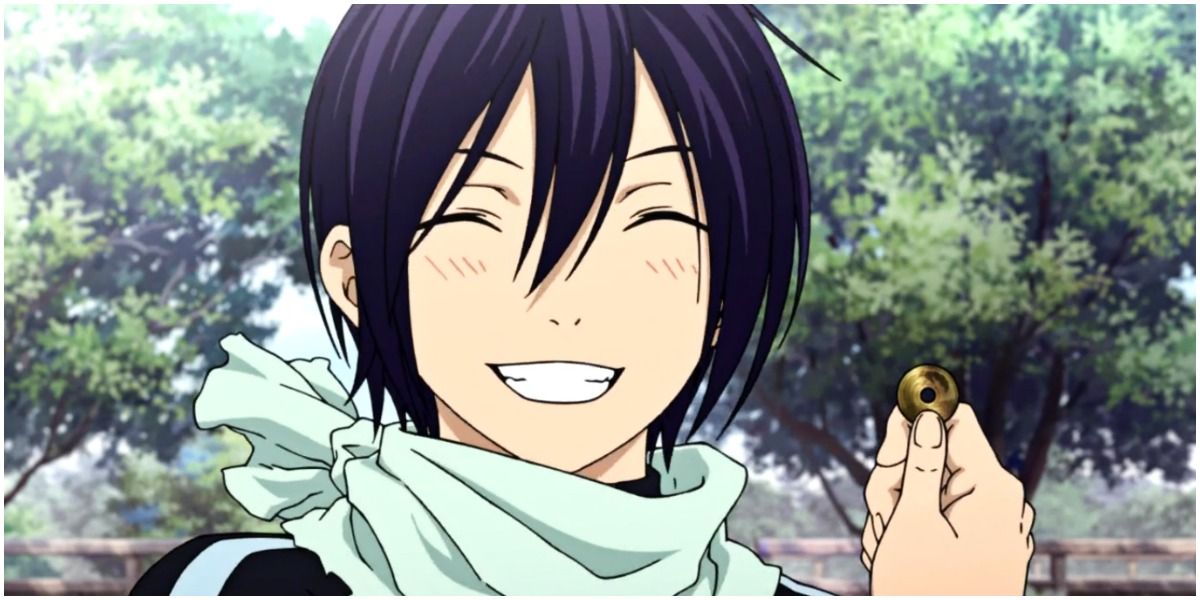 Yato smiling in Noragami while holding a coin