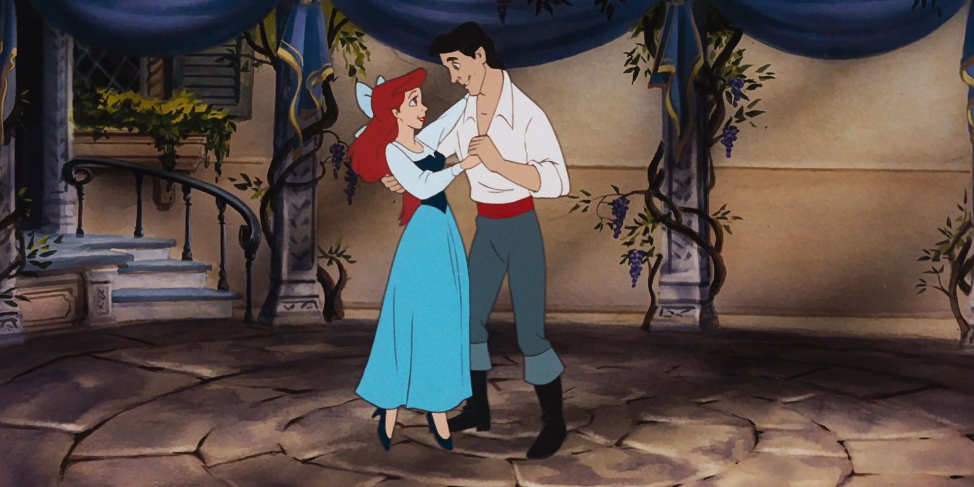 Prince Eric and Ariel dance in The Little Mermaid