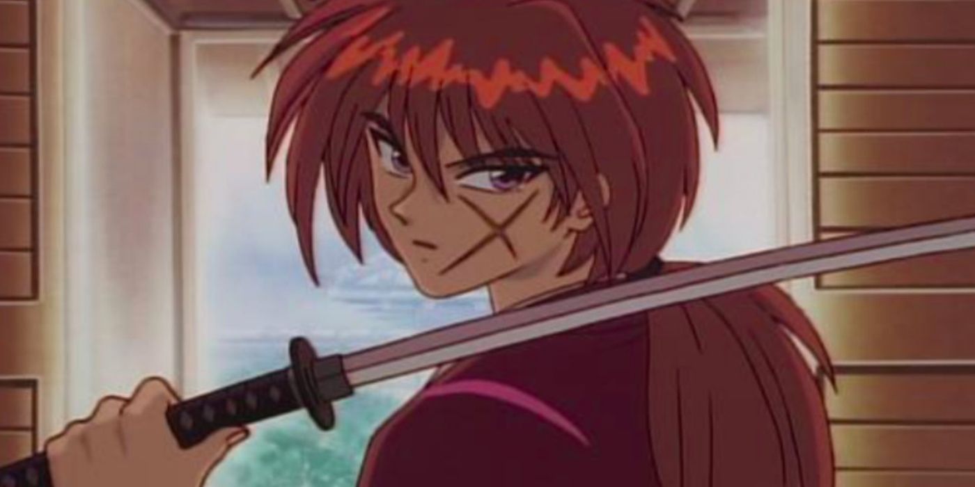 Kenshin from rurouni kenshin holding his sword on his shoulder