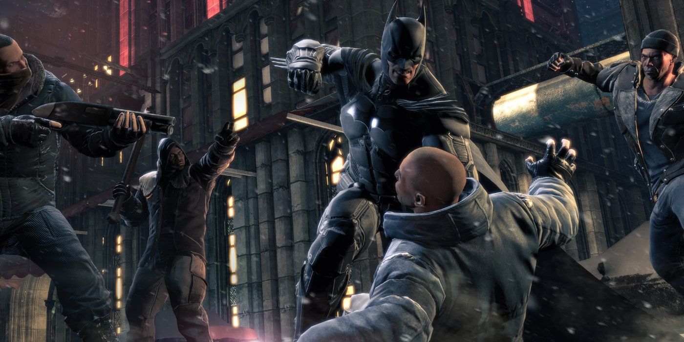 Batman beats a group of thugs down in the Arkham Asylum games