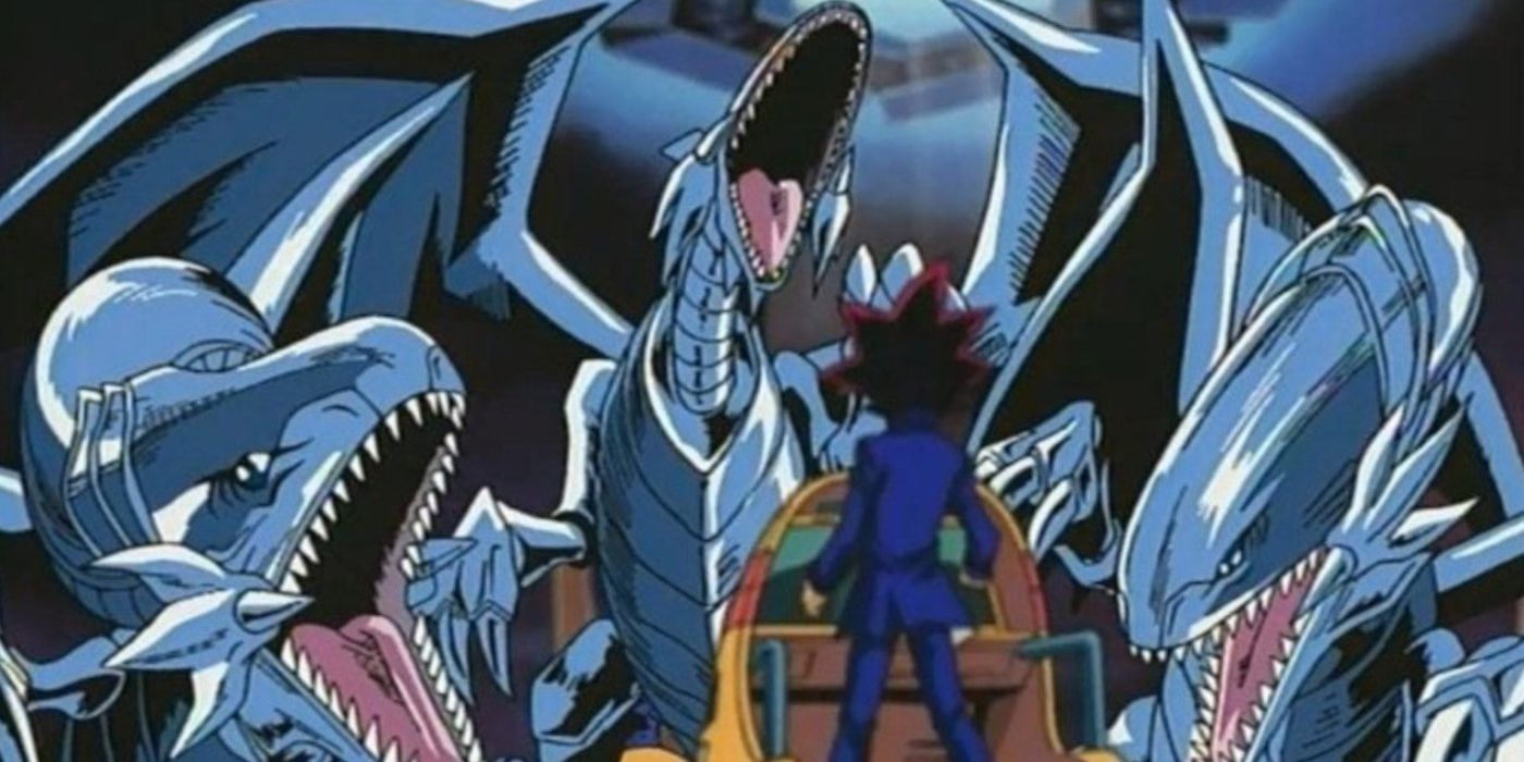 Yugi surrounded by three Blue Eyes White Dragons, Yu-Gi-Oh!