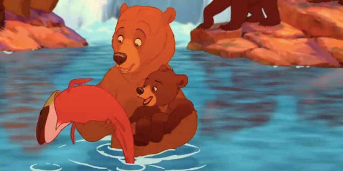 Kenai and Koda with a salmon in Disney's Brother Bear