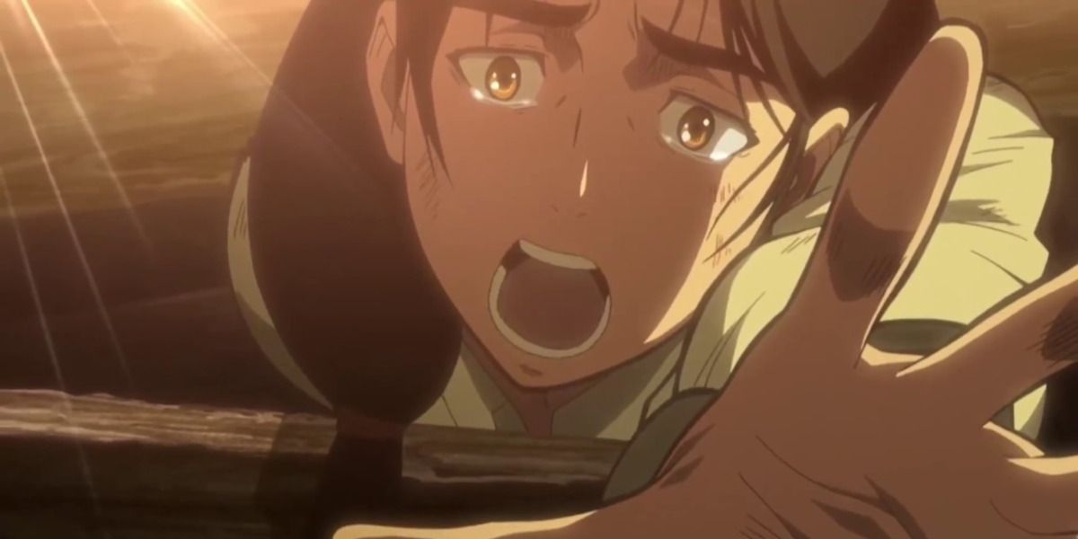 Carla Yeager trapped under rubble reaching out in Attack on Titan.