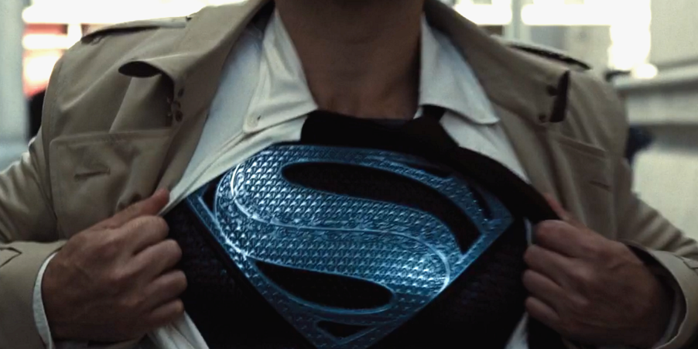 Clark Kent Revealing His Black Superman Suit Under His Clothes In Zack Snyder's Justice League