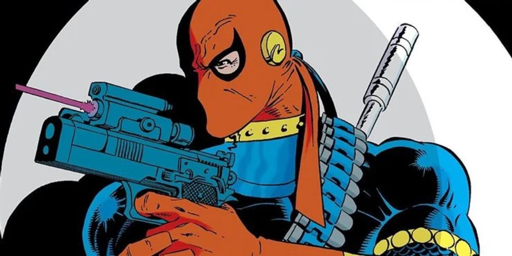 Deathstroke the terminator from the teen titans with gun ready.