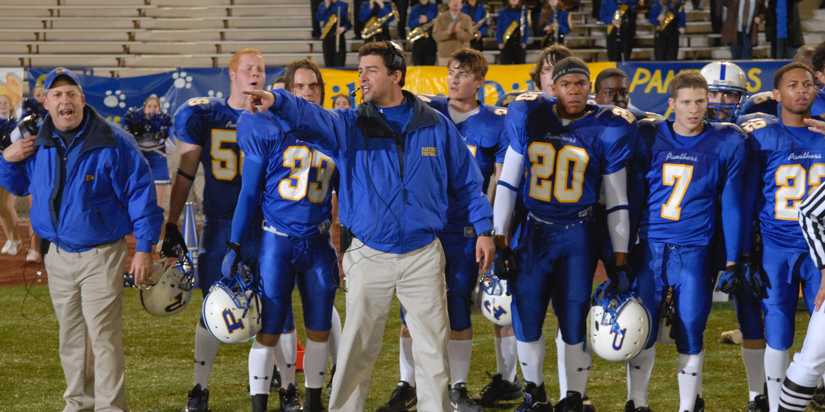 Eric Taylor trains his football players on the field at Friday Night Lights