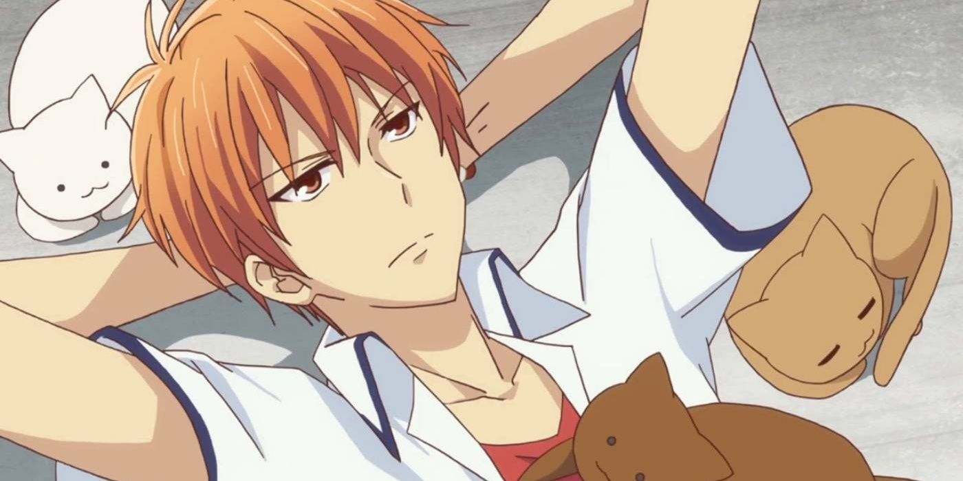 Kyo Sohma surrounded by cats in Fruits Basket.