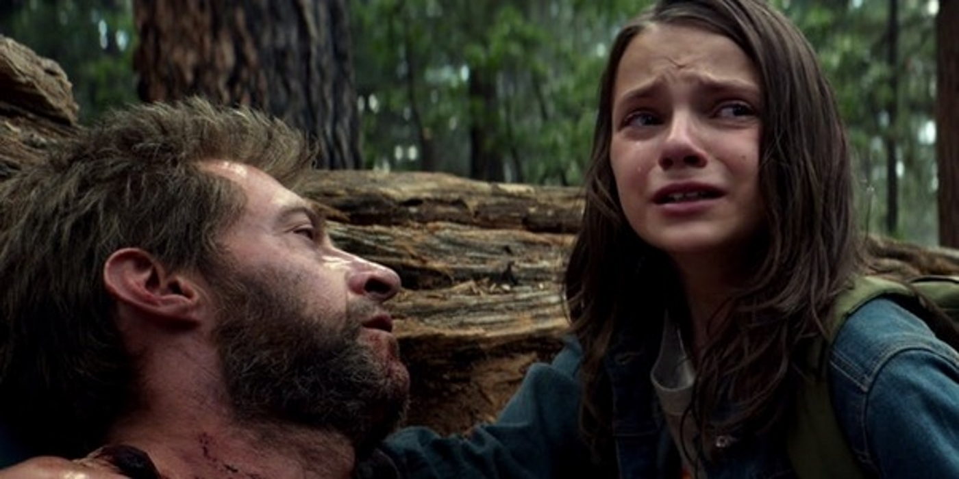 A dying Wolverine in the X-Men film, Logan, while Laura (X-24) looks on in tears