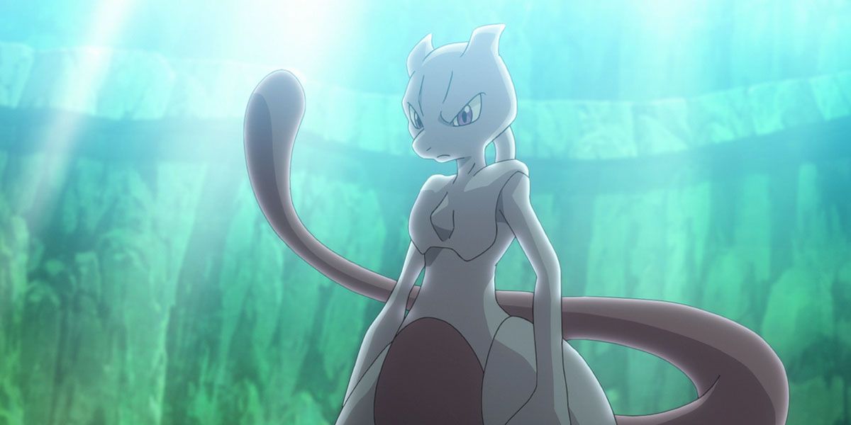 Mewtwo stands there as sun shines down behind him in Pokemon Journeys