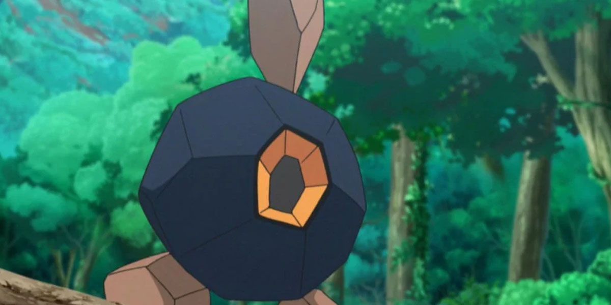 A wild Roggenrola in the forest in Pokemon 