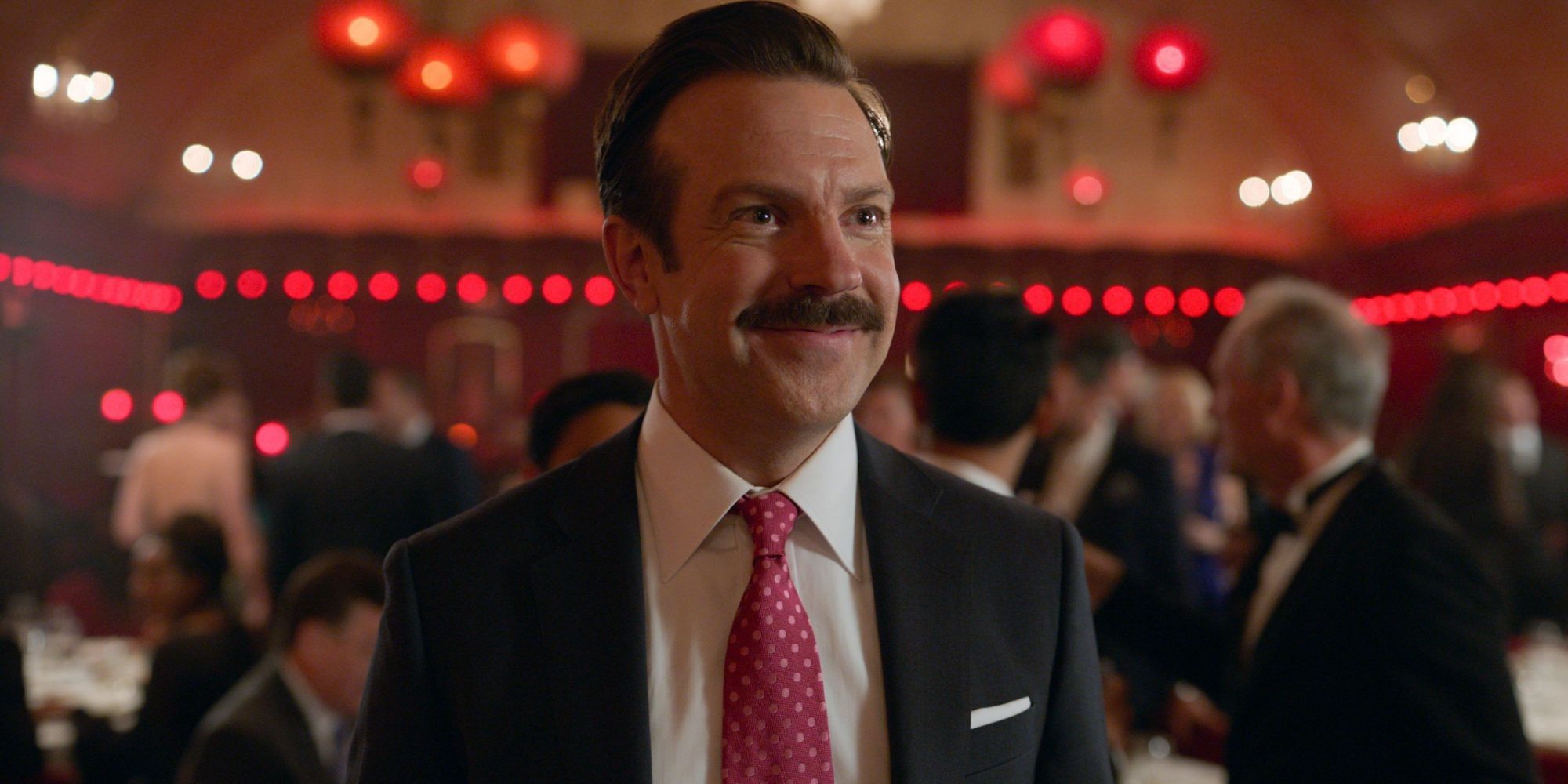 Ted Lasso in a suit charity event