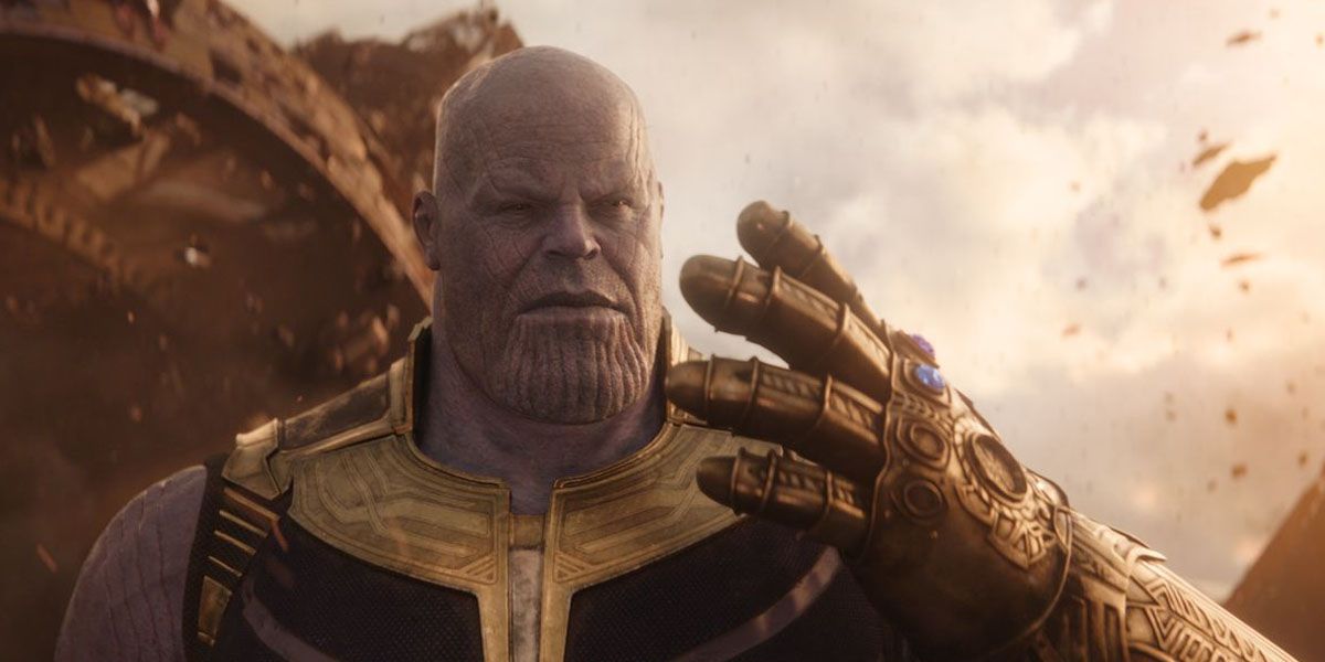 Thanos holds up his gauntlet