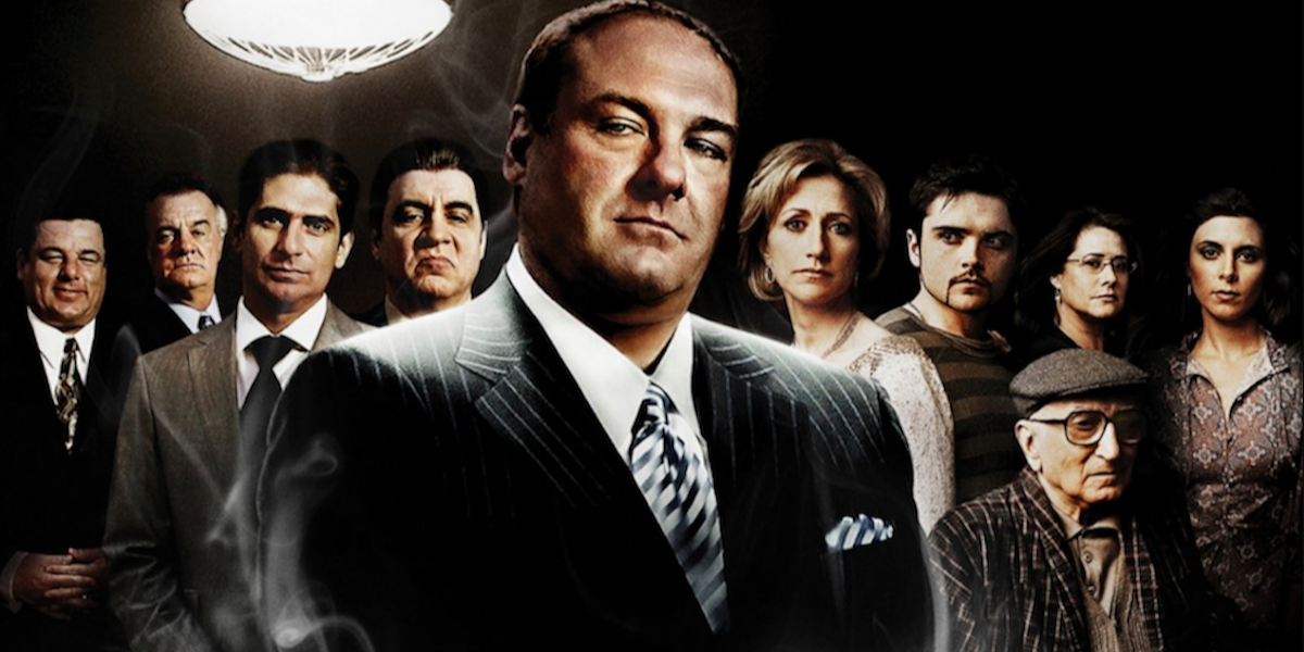 Portrait of the cast of The Sopranos with Tony Soprano, played by James Gandolfini, in the foreground.