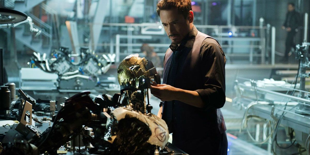 Tony inspects a damaged robot