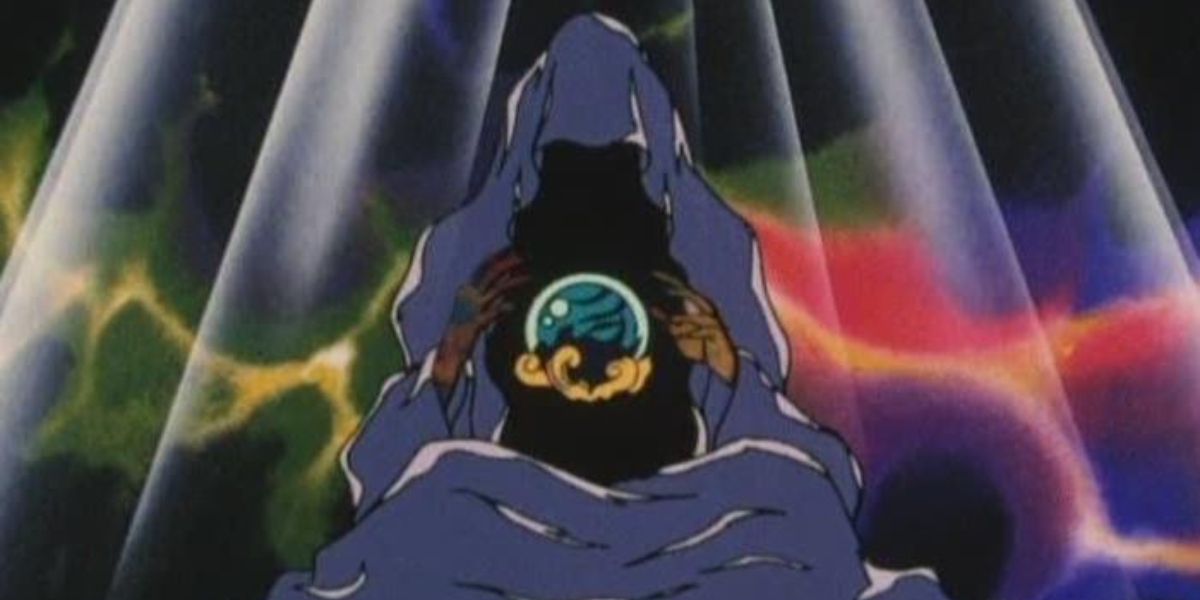 Wiseman waving his hands over a crystal ball in Sailor Moon