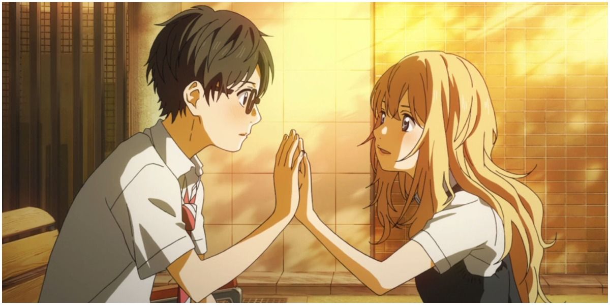 Kousei and Kaori touching hands from Your Lie In April