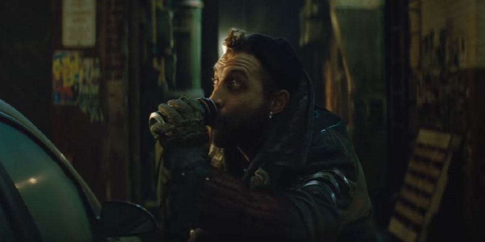 Captain Boomerang sneaks a beer during a Suicide Squad mission
