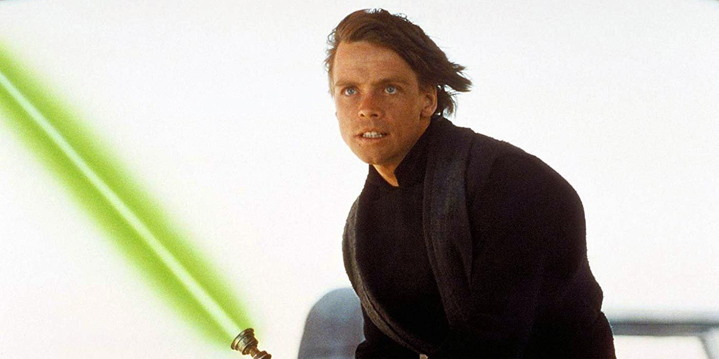 Luke Skywalker holding his green lightsaber in Star Wars: Return of the Jedi