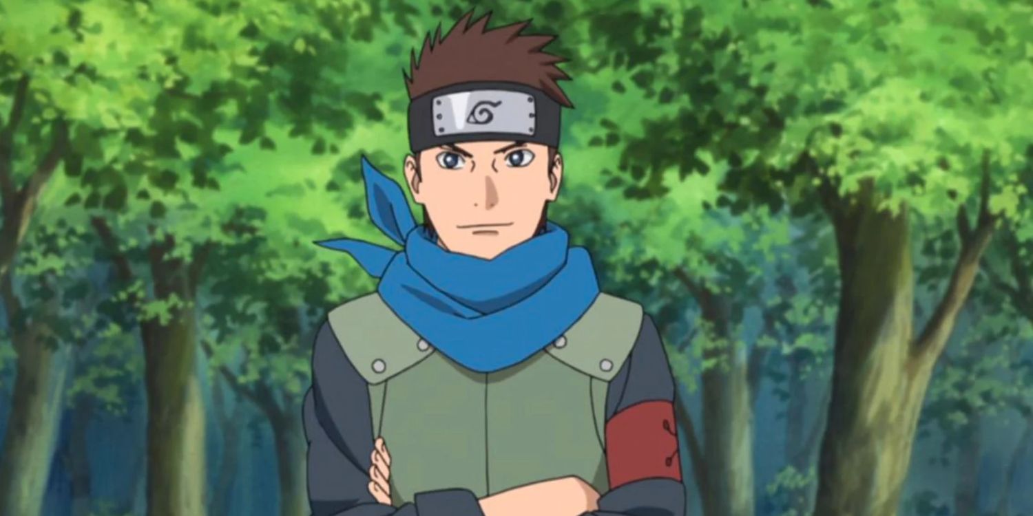 Konohamaru Sarutobi stands with his arms crossed and a forest in the background
