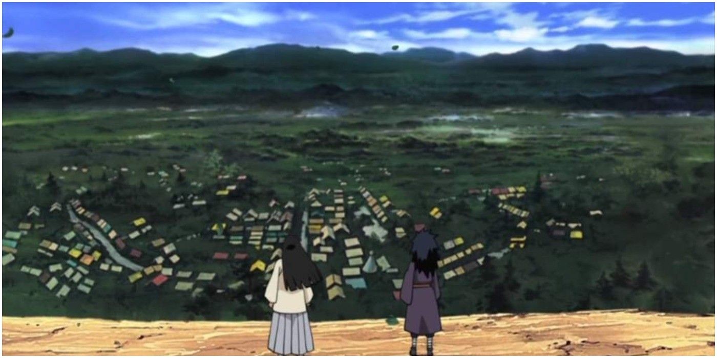 Hashirama and Madara standing and looking over their village