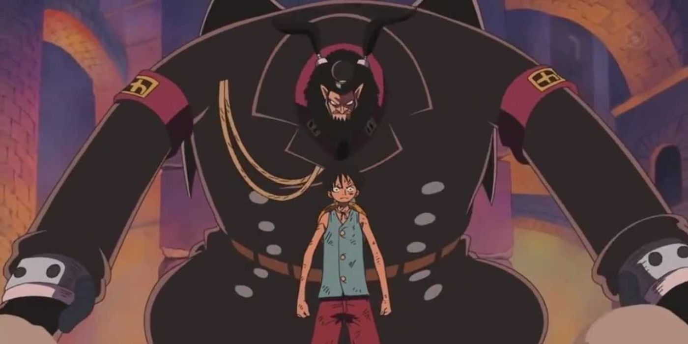 One Piece prison warden looming over Luffy