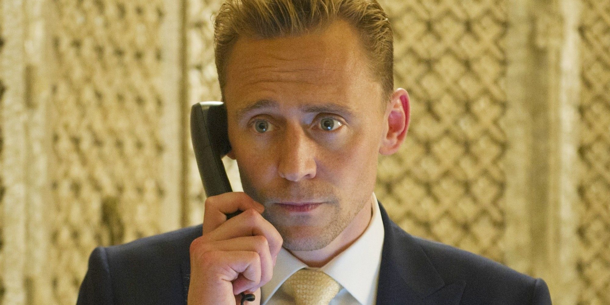 Tom Hiddleston answers the phone in The Night Manager