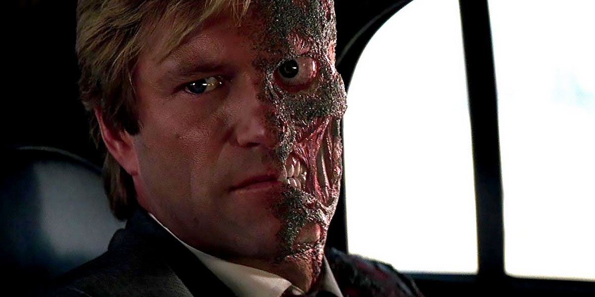 Two face riding in a car