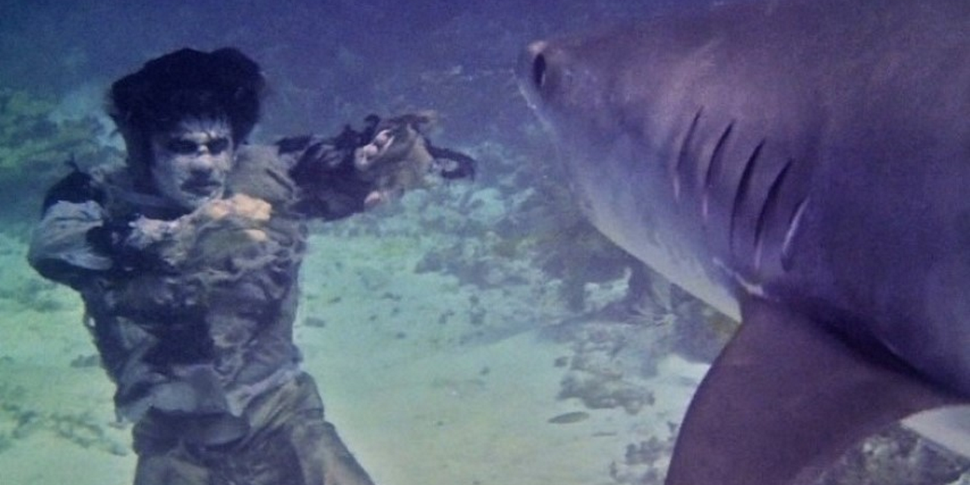 a zombie fights a shark in Zombi 2