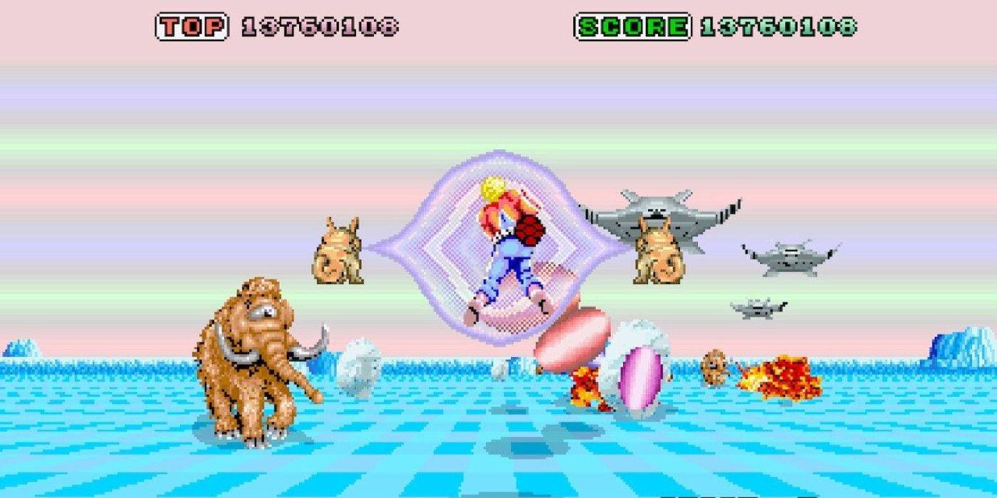 A stage during Space Harrier. On a pastel landscape, a man wearing red and blue fights ornithopters or flapping aircraft, and cycloptic mastodons.