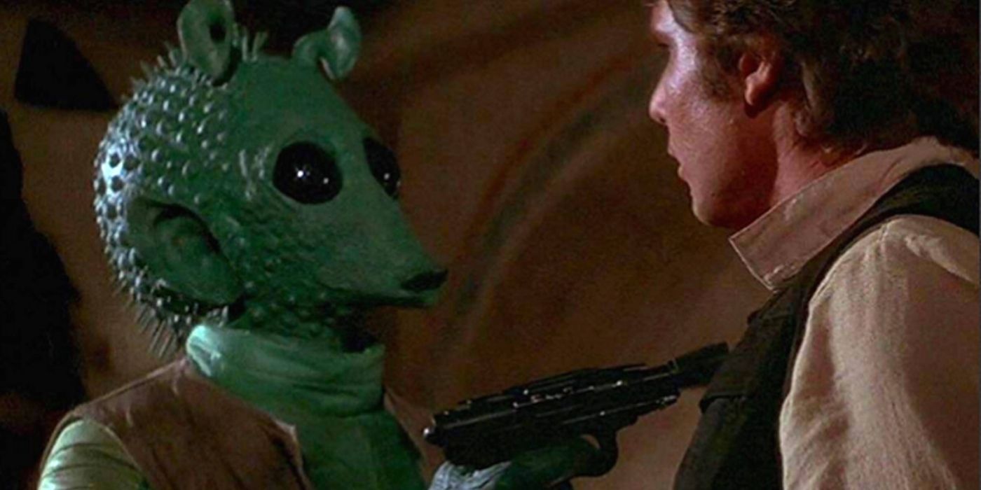 Greedo pointing his blaster at Han Solo's chest in A New Hope.