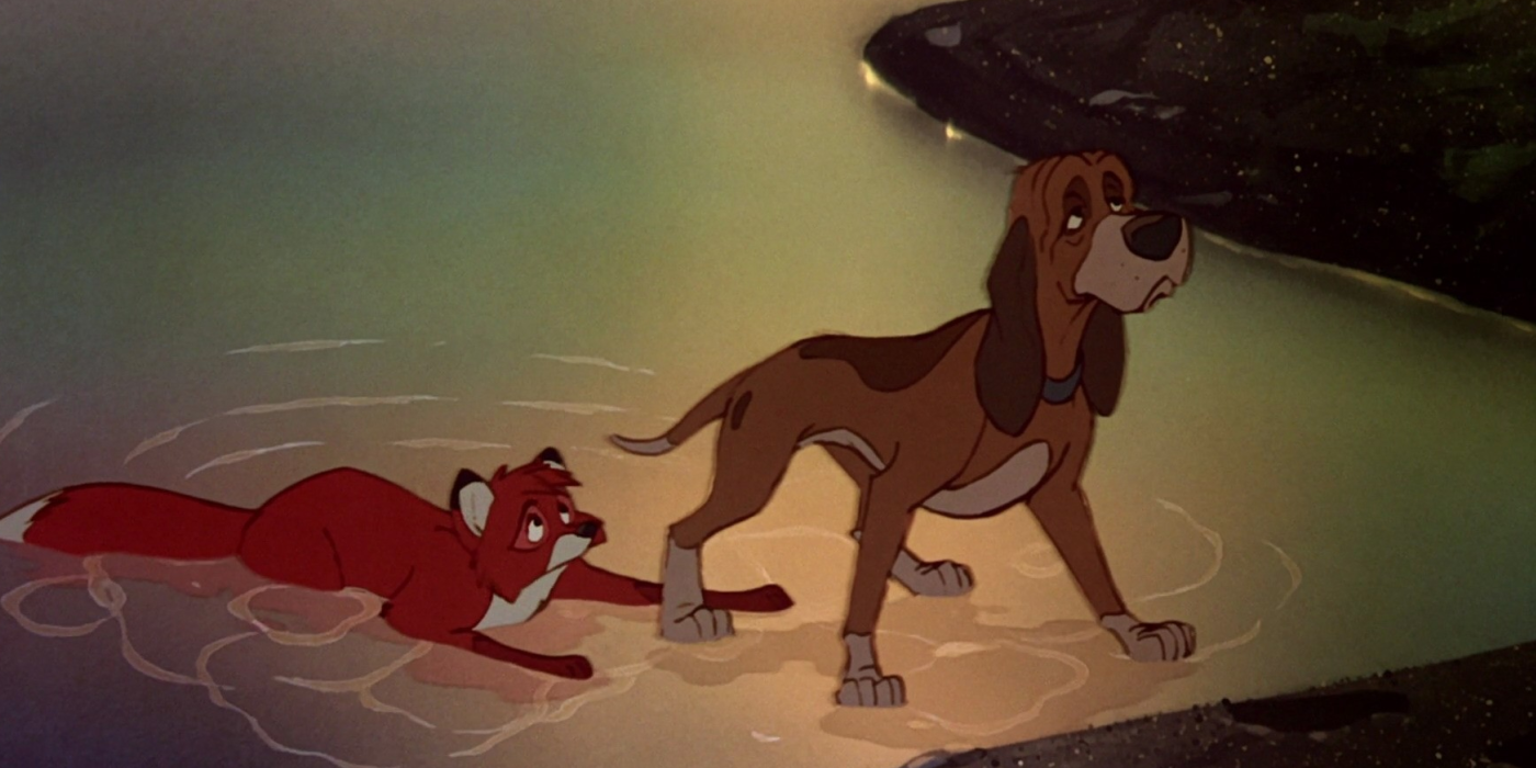 Copper protecting Tod from Amos' gun in The Fox and The Hound.