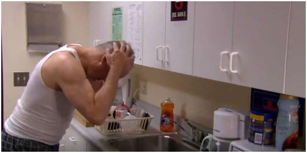 Creed washing his hair in the sink