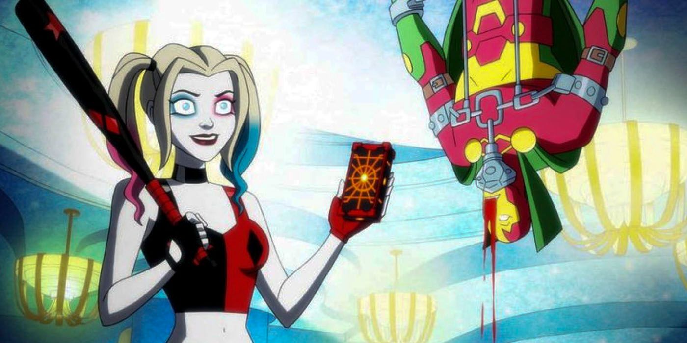 Harley Quinn stands holding a glowy black and orange box and her bat in front of Mr. Miracle who is dangling from the ceiling and bleeding from the head.
