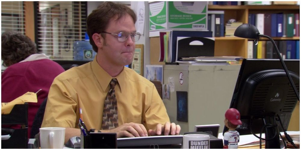 Dwight typing on his computer