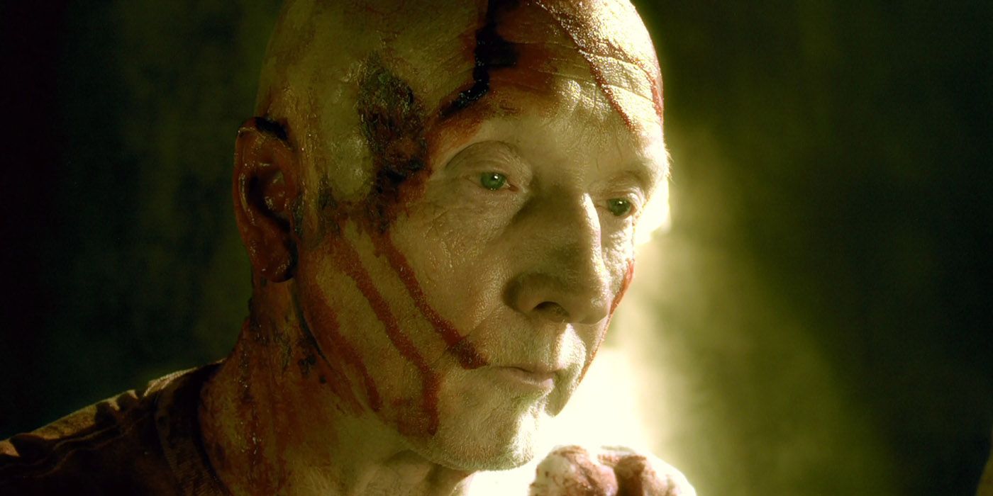 John Kramer with a bloodied head in Saw