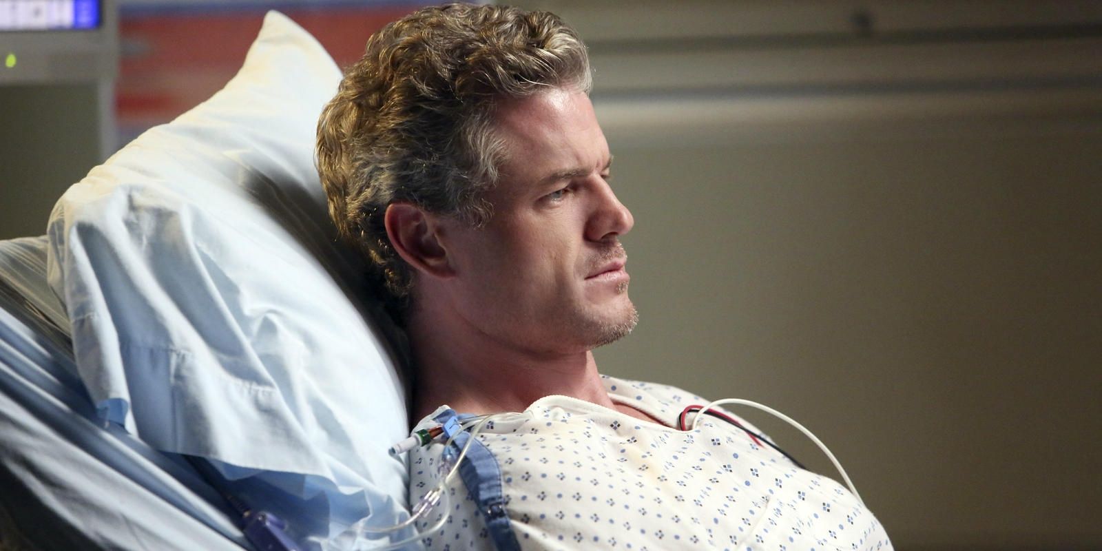 Mark Sloan lying in a hospital bed in Grey's Anatomy
