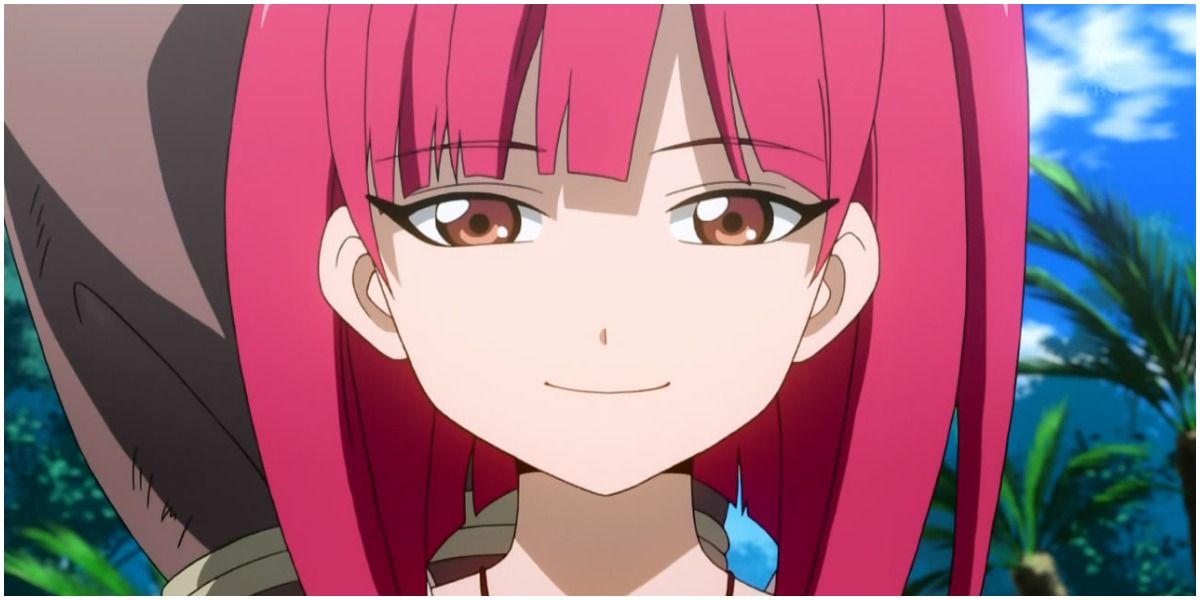 Morgiana from Magi The Labyrinth Of Magic with pink hair smiling.