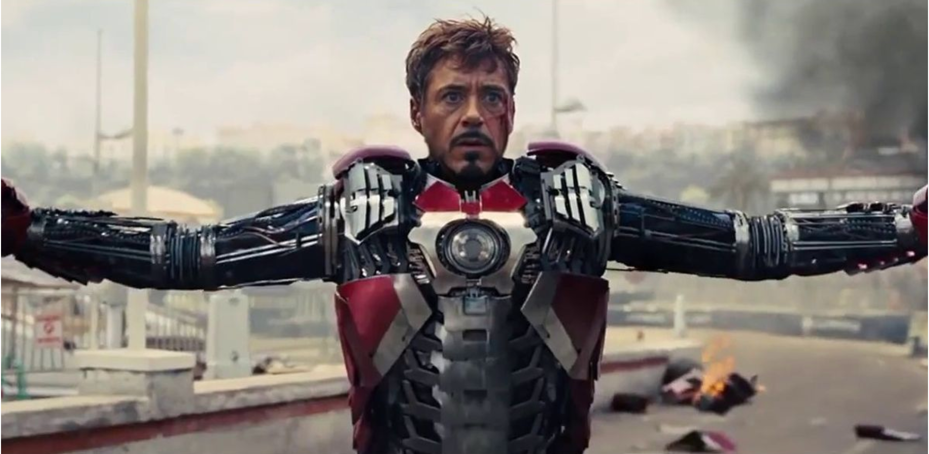 Tony Stark raising his arms