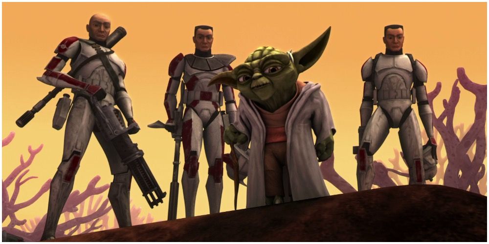 Yoda standing on a hill with some clone troopers