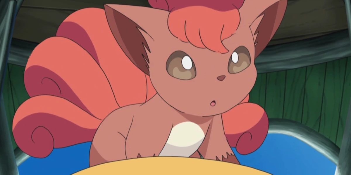Vulpix standing over a food bowl in Pokémon.