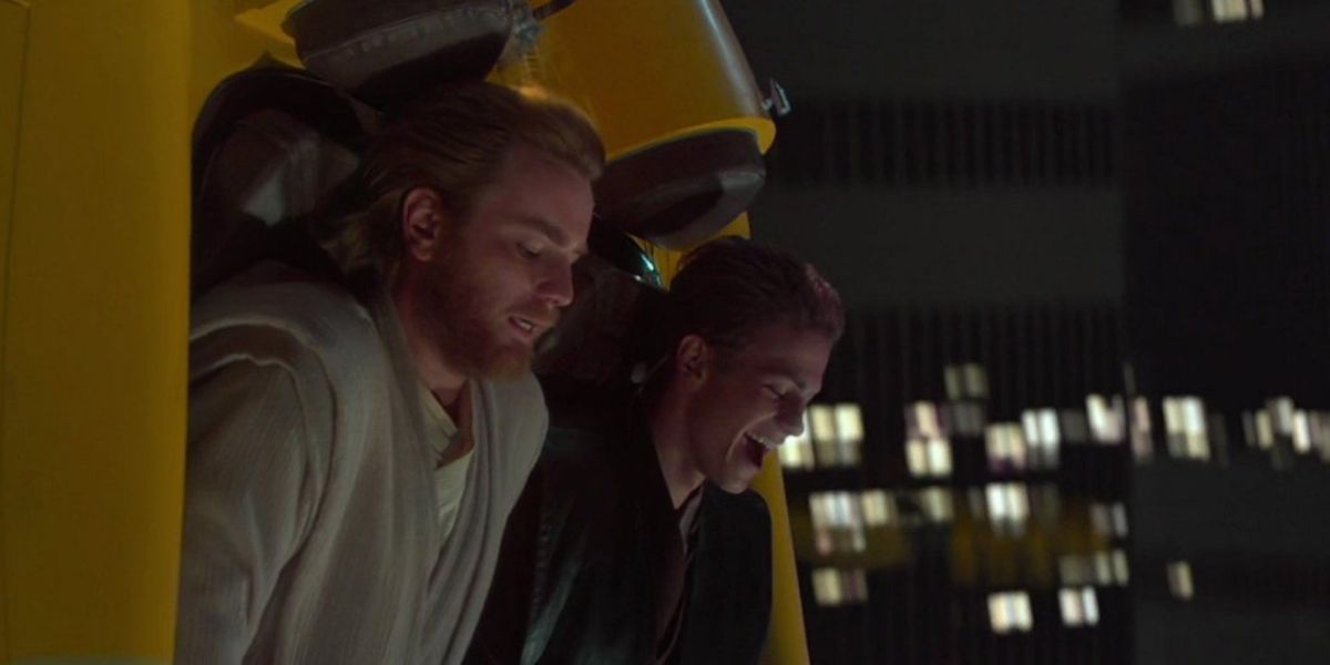 Anakin laughs while Obi-Wan appears anxious in a speeder in Star Wars.