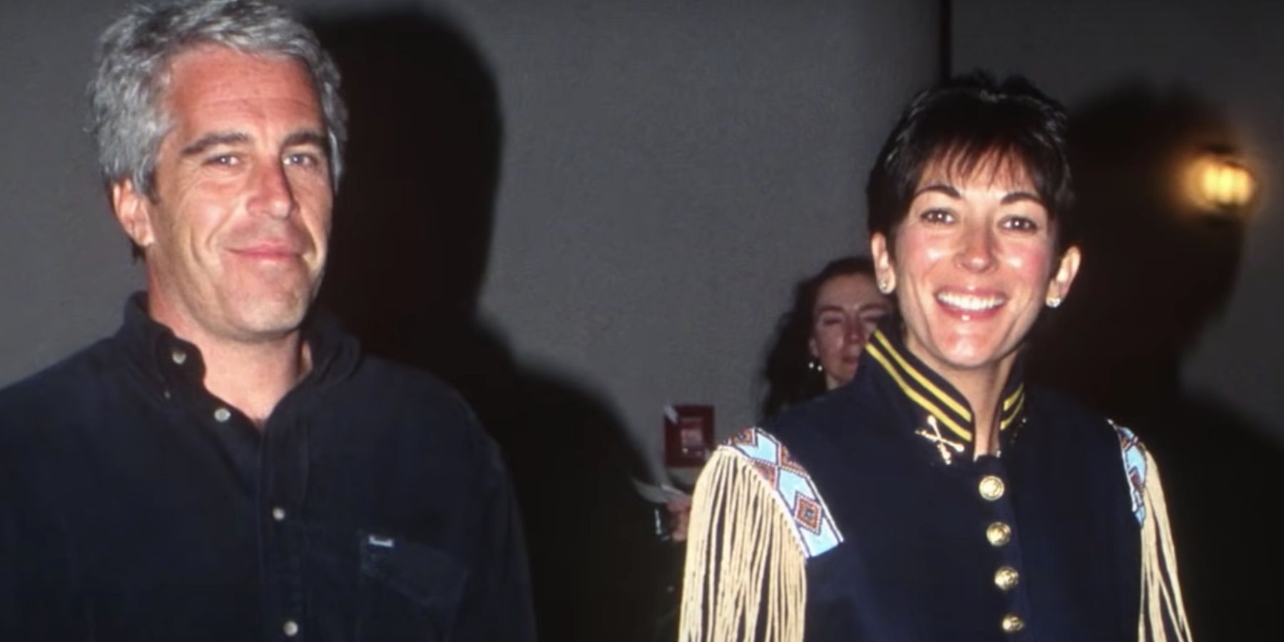 Ghislaine Maxwell pictured with Epstein, taken from official trailer for Epstein's Shadow.