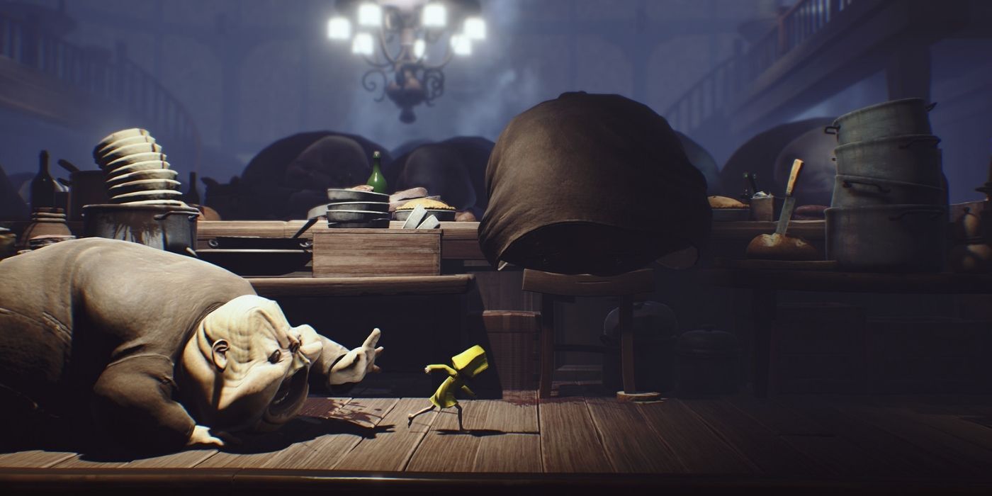 Six sneaks past the guests in Little Nightmares.