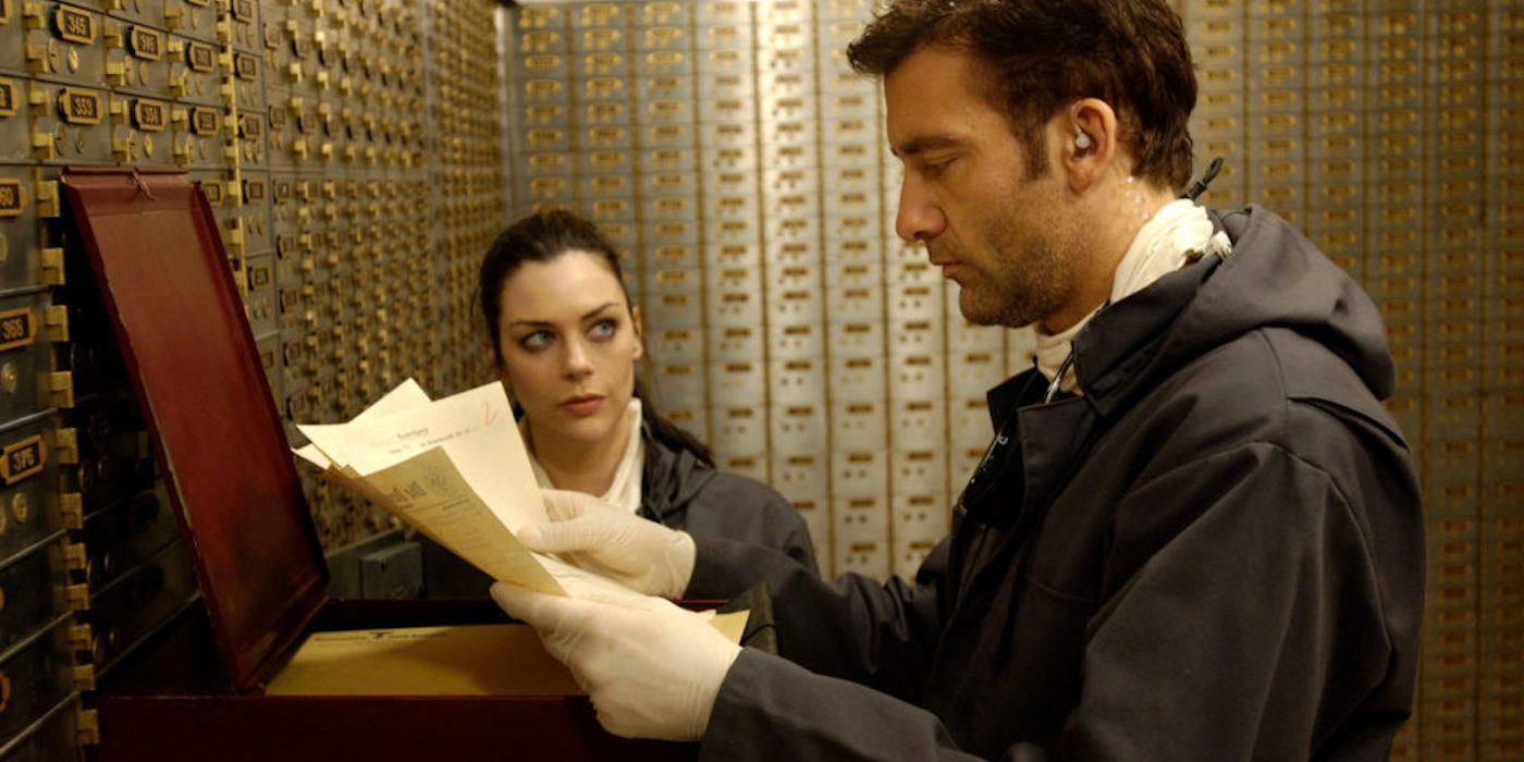 Dalton searching through documents with Stevie in Inside Man