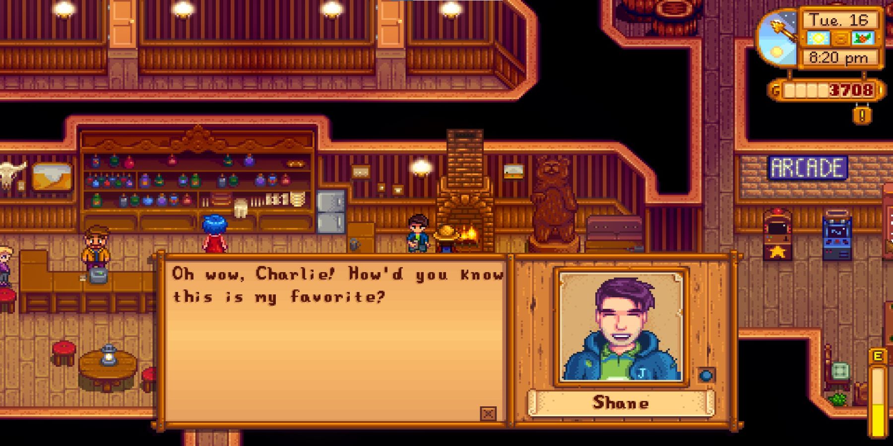 Shane hanging out in the Stardrop Saloon happy with a gift he's been given
