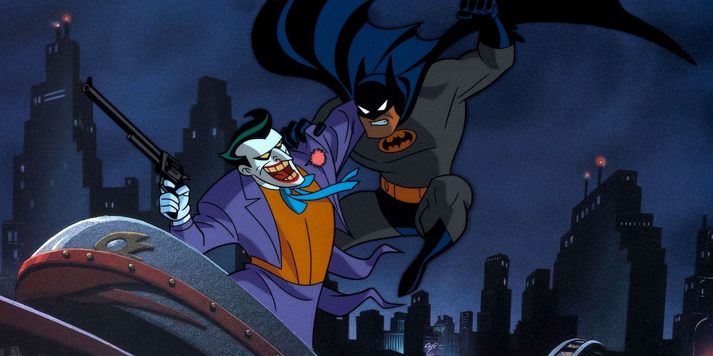 Batman fights the Joker on top of a rollercoaster