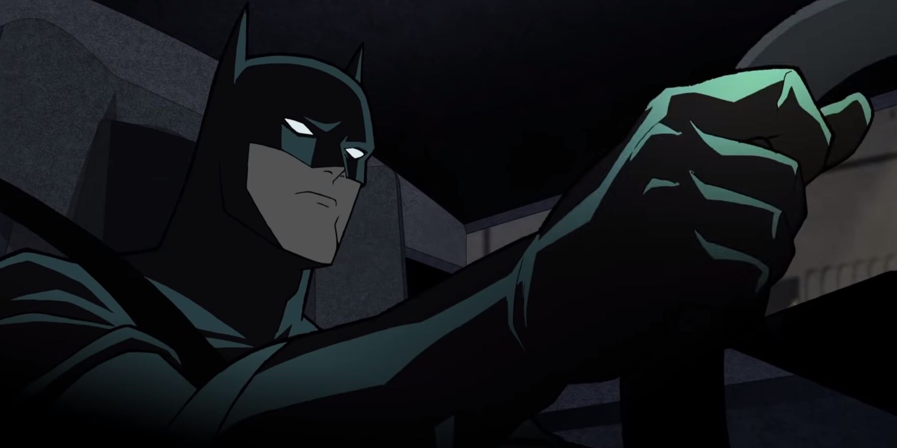Batman driving the Batmobile through Gotham City in Batman: The Long Halloween